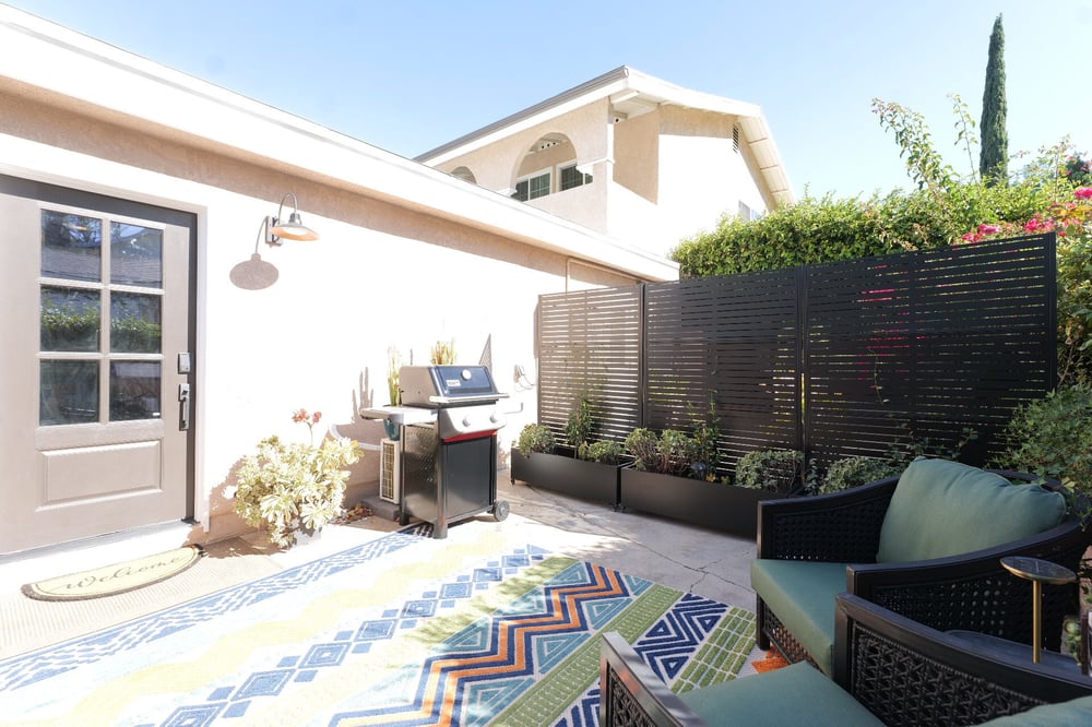 Private outdoor sitting area and exterior of a Los Angeles ADU