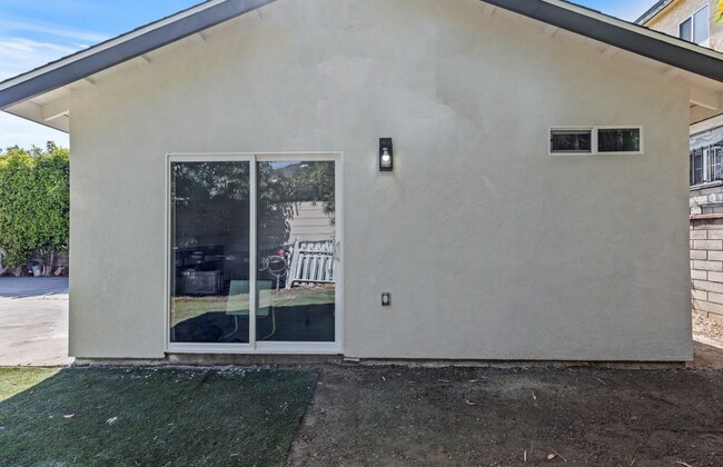 35th-Pl-ADU-exterior-sliding-door-650x420
